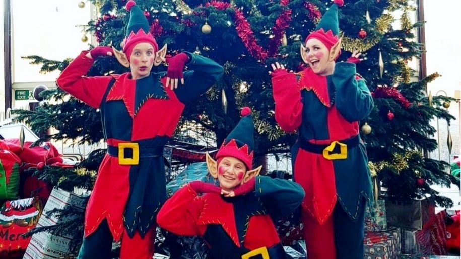 three elves in costume