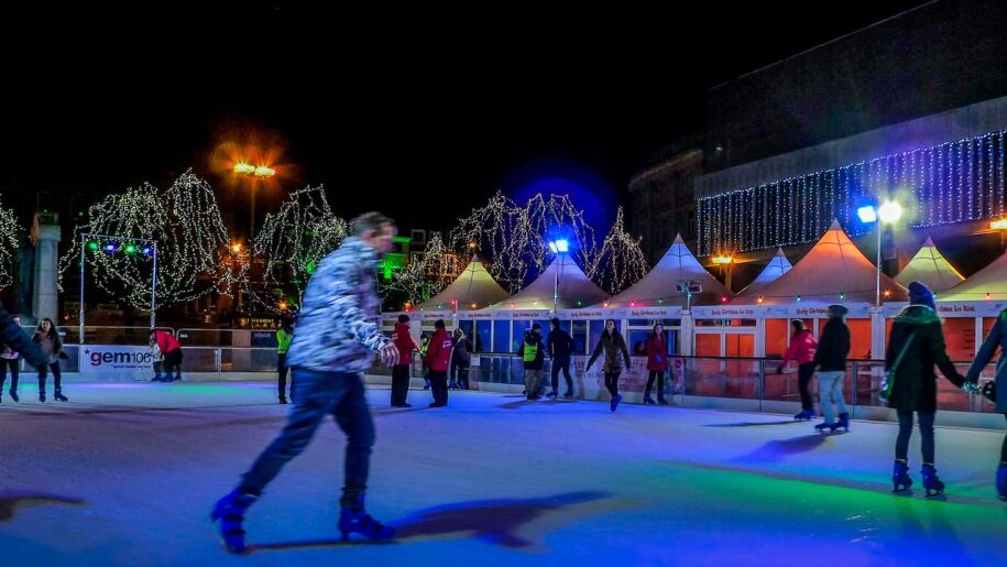 Skaters on the ice rink at Winter Glow in Worcestershire.