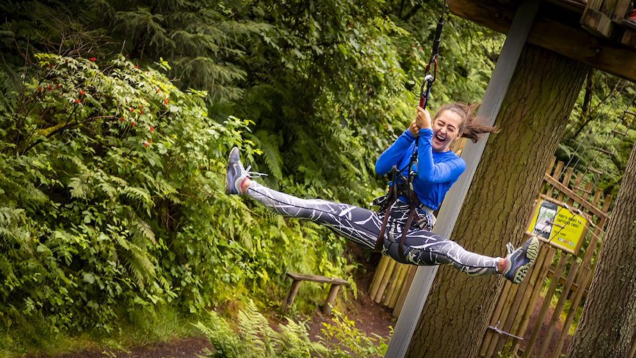 woman on zip wire at Go Ape