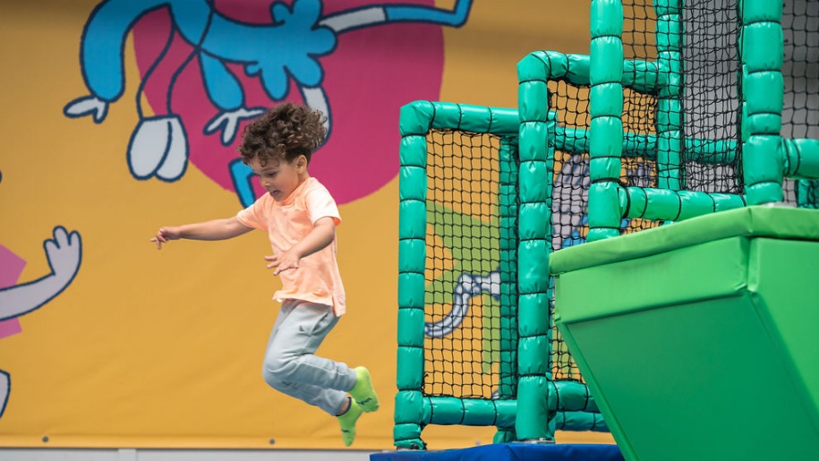 Jump in summer pass Esher - Toddler jumping from climbing frame