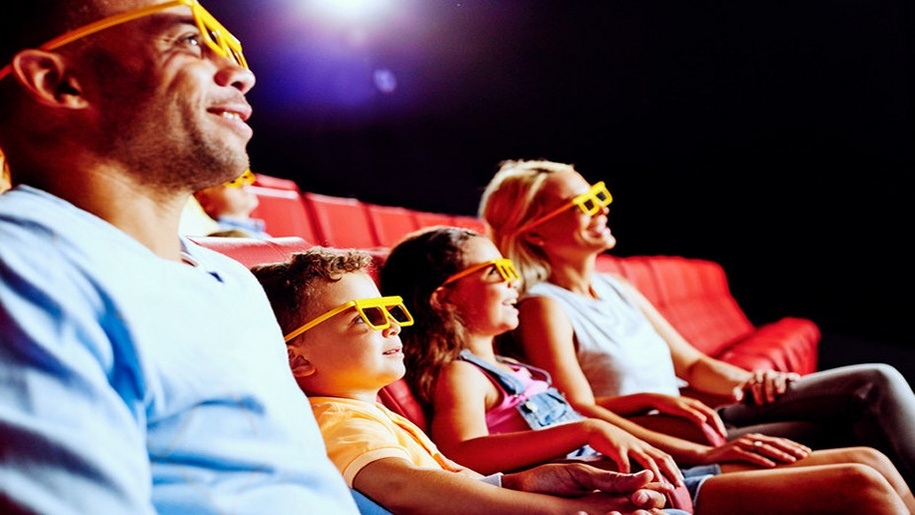 family watching screen wiht 3D glasses at Legoland