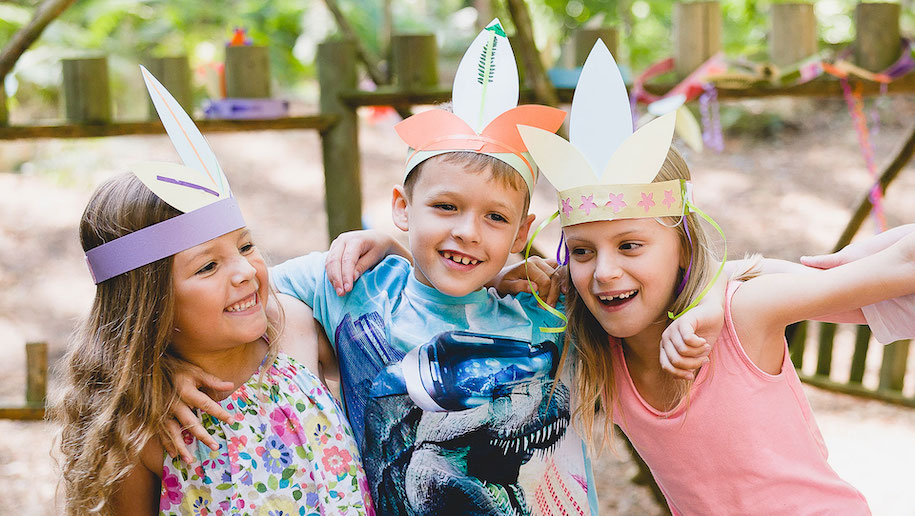 kids wearing paper crowns at Bewliderwood Cheshire