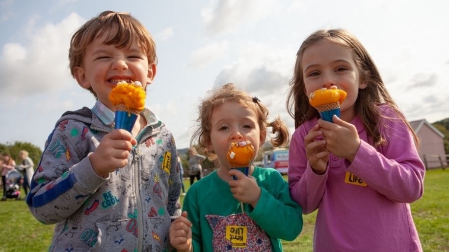 Kent Life - Ice Cream festival - three children eating orange ice creams