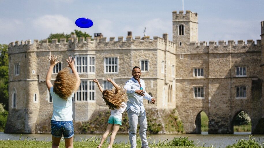 Leeds Castle - children playing frisbee with Dad