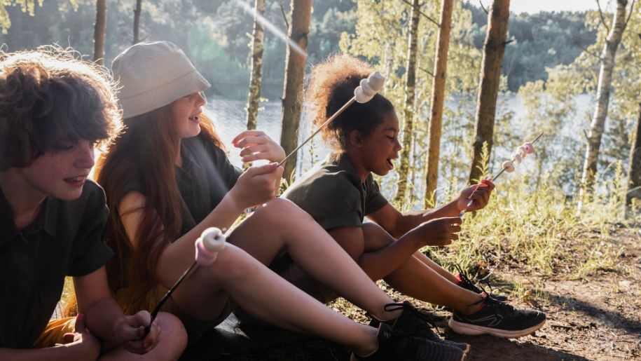 kid camping in the summer