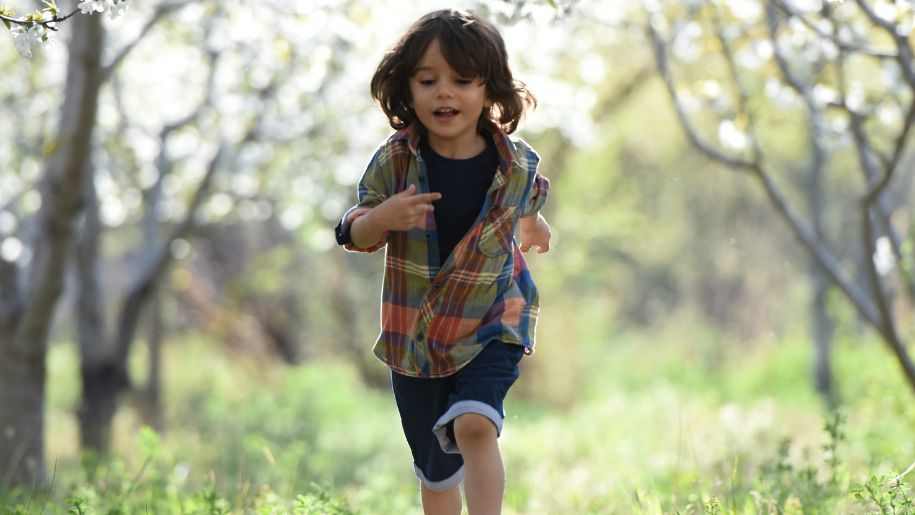 boy running outside