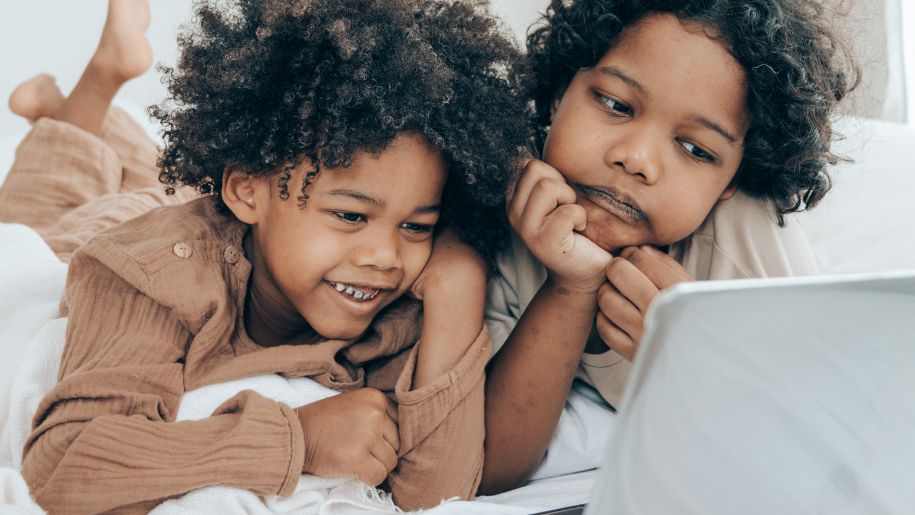 kids watching computer screen