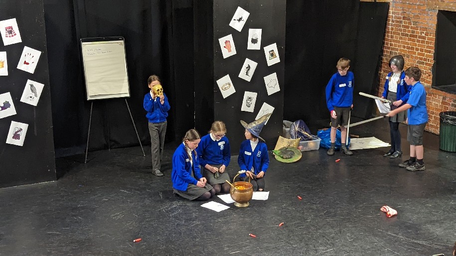 Yvonne Arnaud Theatre Children in uniform creating magic
