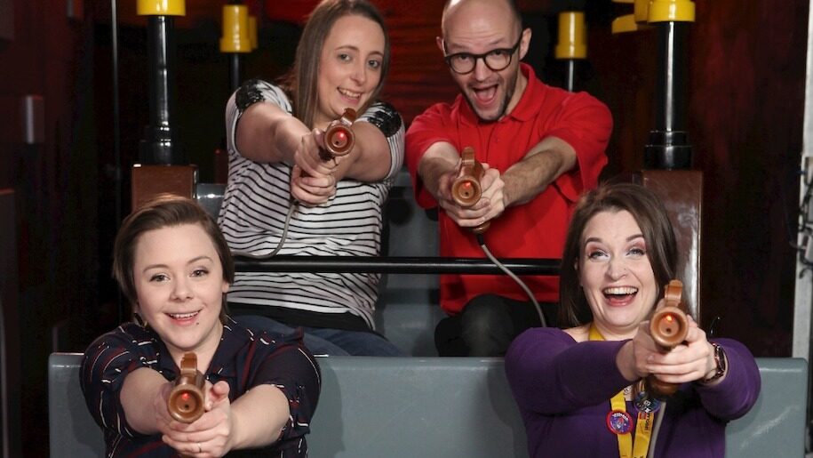 Four adults with laser guns at Legoland Discovery Centre Manchester