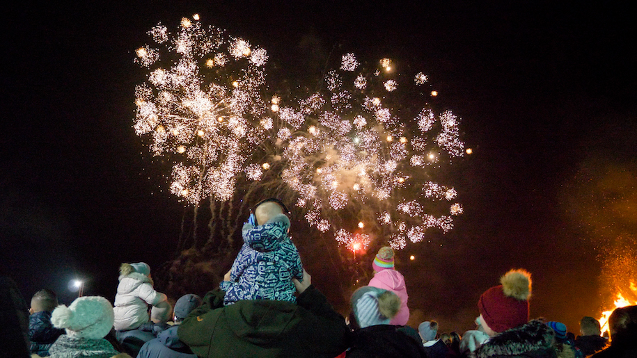 White fireworks over crowd at Thornton Hall Farm