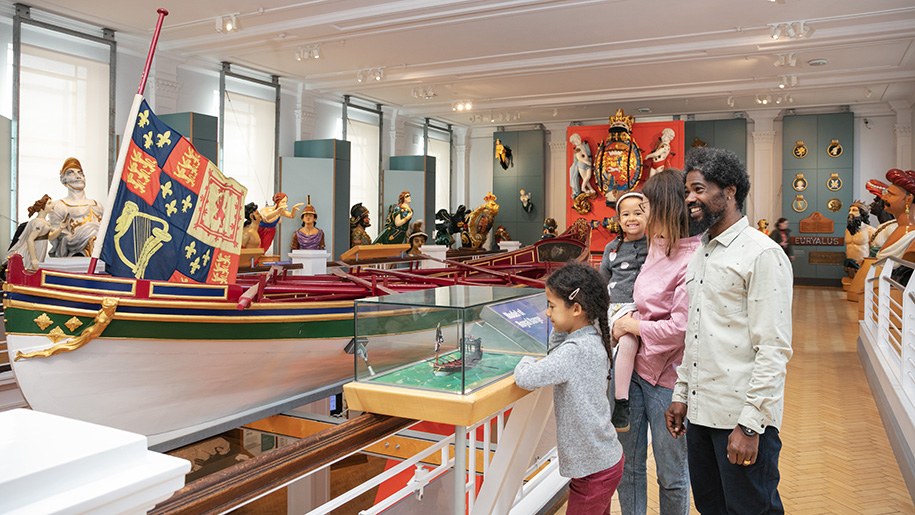 Portsmouth Historic Dockyard Family looking at display