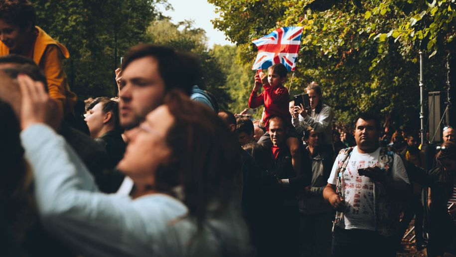 Crowd with a Union Jack Flag.