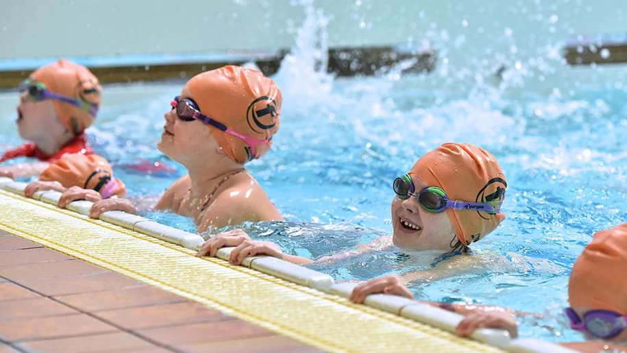 Children learning to swim at Guildford Spectrum's Swimming classes