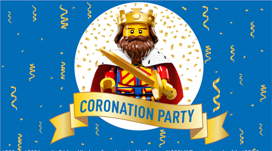 A LEGO figure in a crown and cloak for the King's Coronation Party at LEGOLAND Discovery Centre.