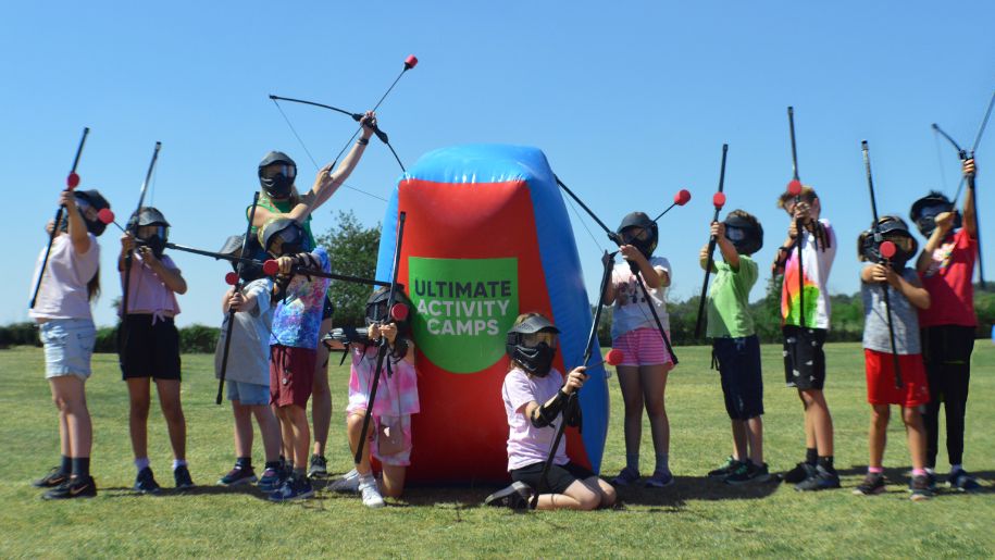 Children playing at archery course at Ultimate Activity Camps