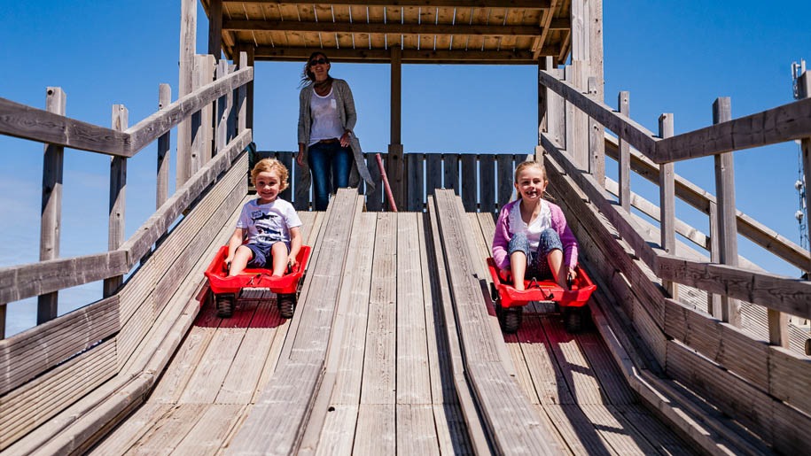 Tapnell Farm park Children on wooden slide