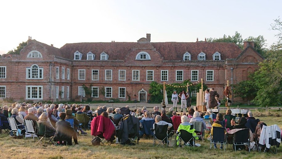 West Horsley Place People sitting in front of the House watching a theatre production