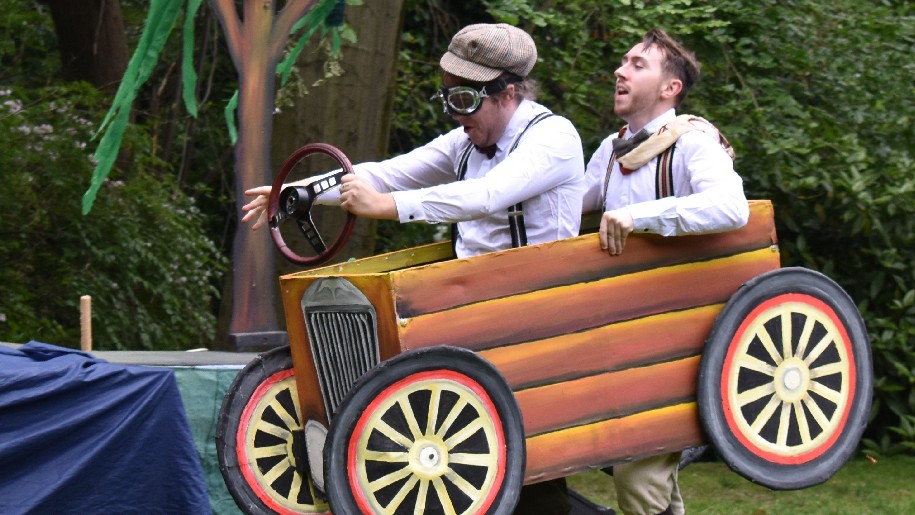 West Horsley Place Two men in a car as in Wind in the Willows