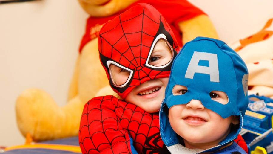 Children dressed up as Spider Man and Captain America.