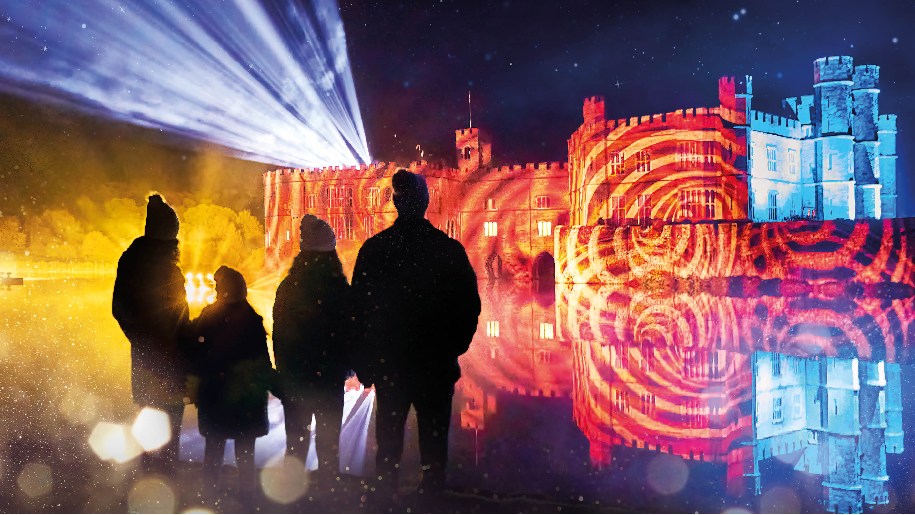 Leeds Castle Christmas Lights 2023 Family looking at Castle covered in lights