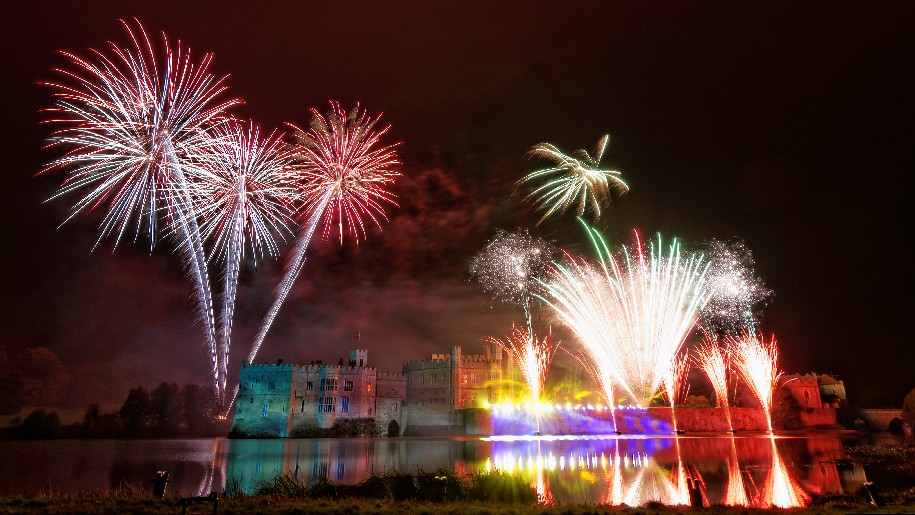 Leeds Castle Firework Spectacular scene of fireworks over the Castle and Moat