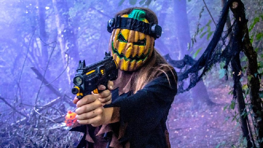 New Forest Activities Halloween Man with a pumpkin face shooting a laser