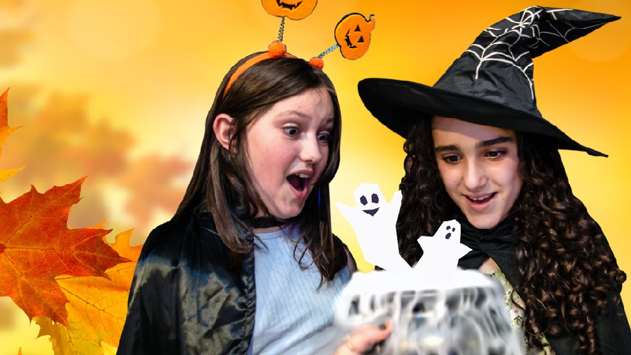 Winchester Science Centre Science Spooktacular event One girl dressed as witch, the other with pumpkin headdress