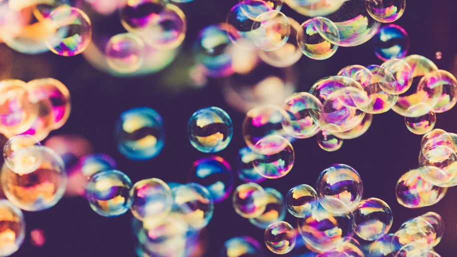 Colourful bubbles floating through the air