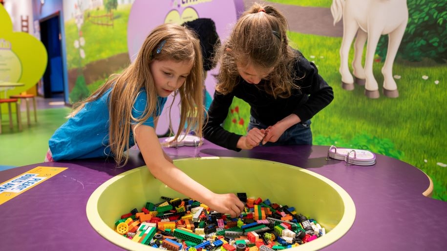 Children building models at LEGOLAND Discovery Centre Birmingham.