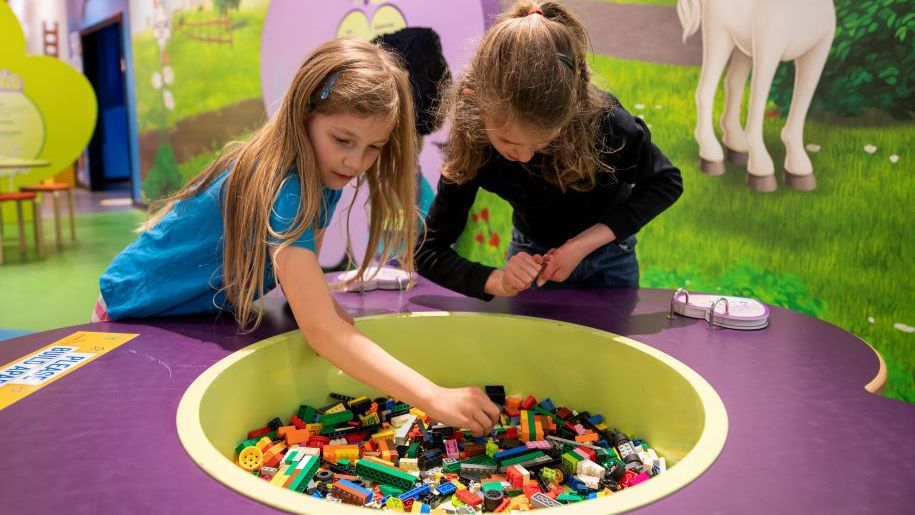 Girls playing with lego at LEGOLAND Discovery Centre