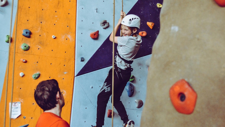 Child on a climbing wall.