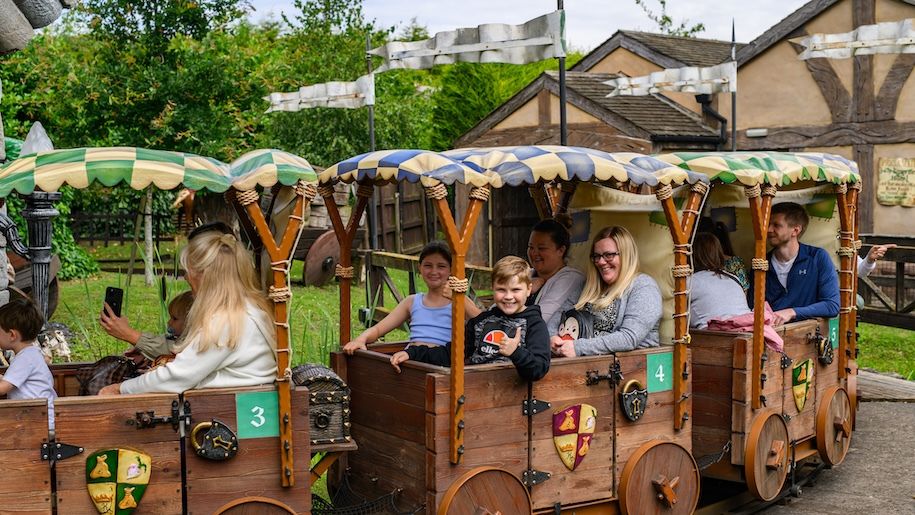 Families on a train ride at Sundown Adventureland