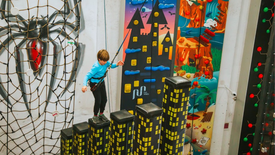 A child on Cityscape Towers at Crazy Climb Bristol.