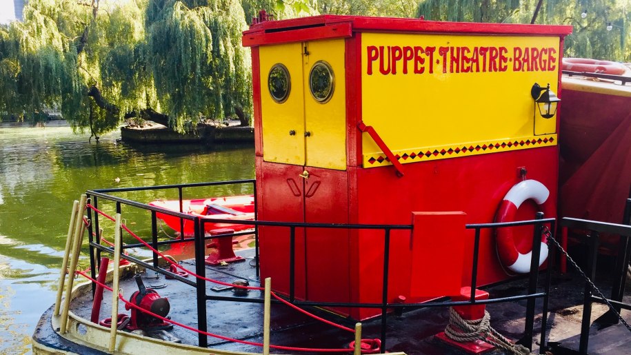 The red and yellow Puppet Theatre Barge.