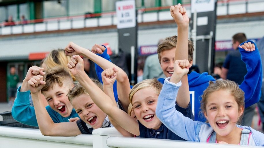 Children cheering at Wolverhampton Racecourse.