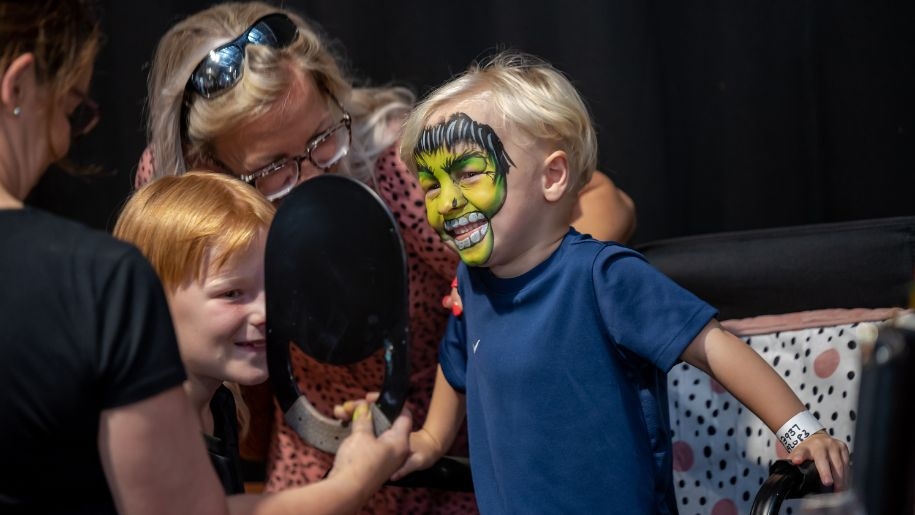 Face painting at Newcastle Racecourse in Tyne and Wear.
