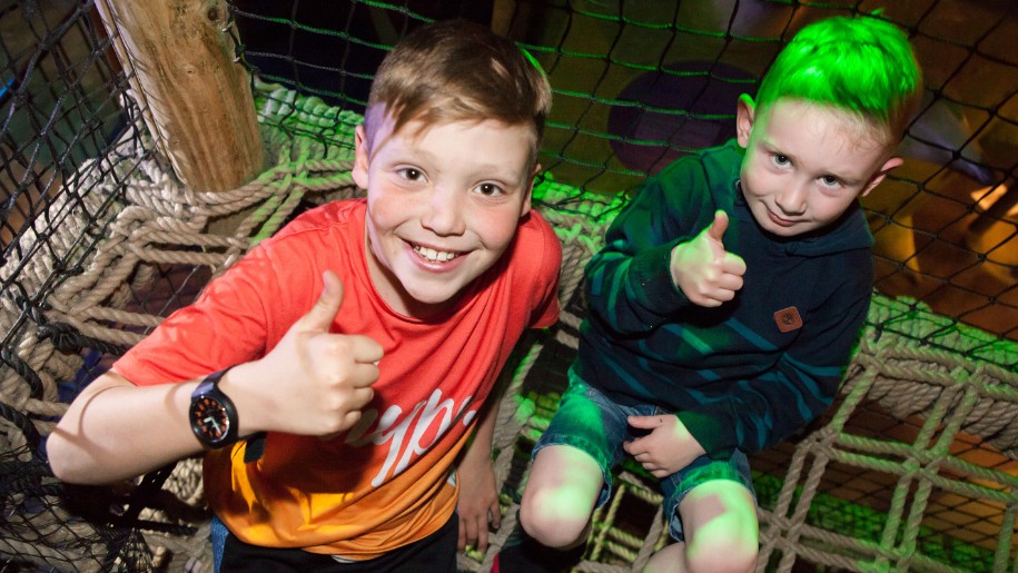 Two children playing at Conkers.