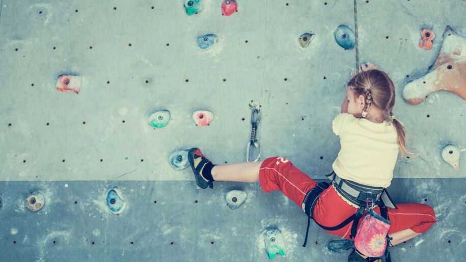 SHUTTERSTOCK girl on climbing wall