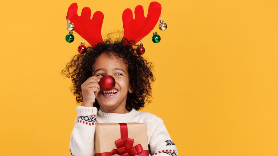 girl with Christmas antlers on her head