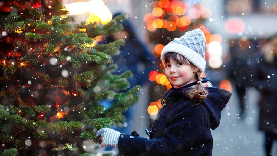 girl and Christmas tree