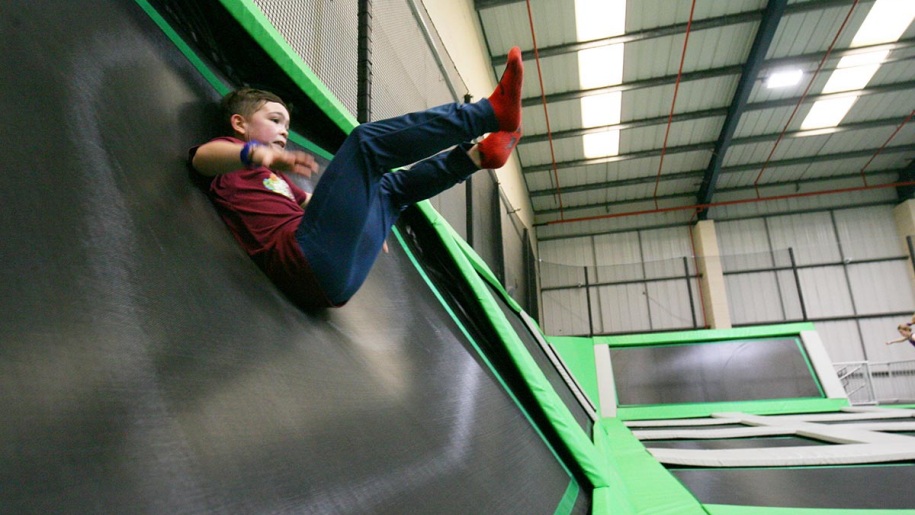 A child bouncing off a wall trampoline at AirHop Blackpool.