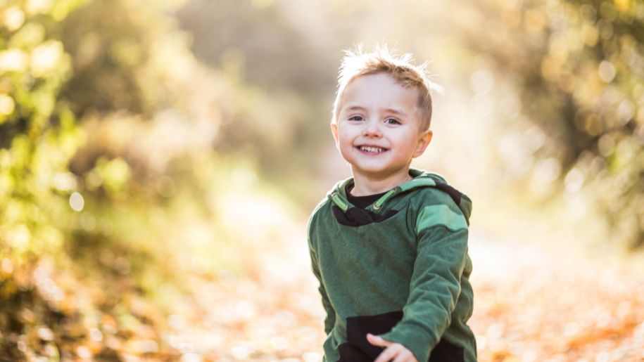 Boy running in the outside