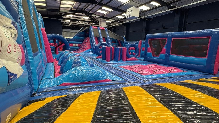 Brightly coloured trampoline attractions at AirHop Gloucester.