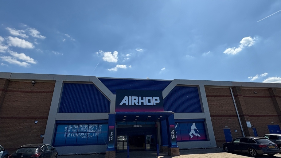 Main entrance and car parking at AirHop Gloucester.