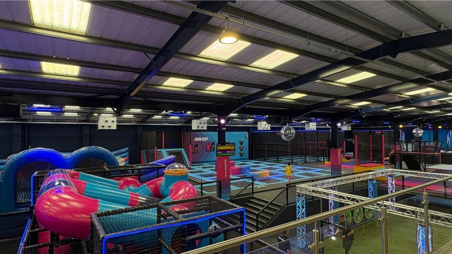 Brightly coloured trampoline attractions at AirHop Gloucester.