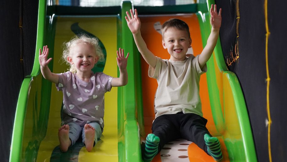 kids on soft play slides