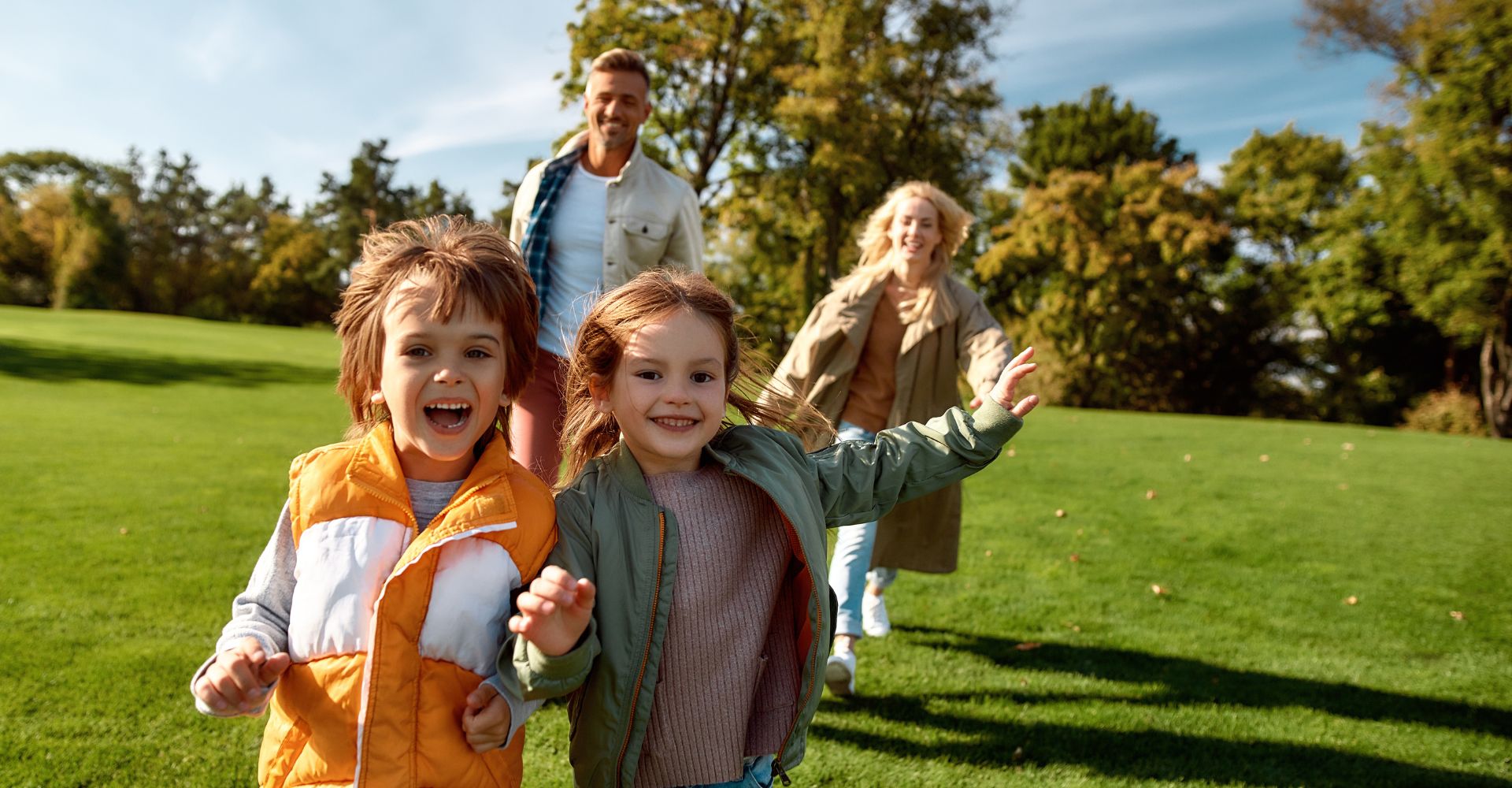 family run across sunny field