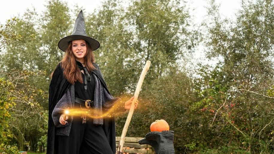 girl dressed as a witch