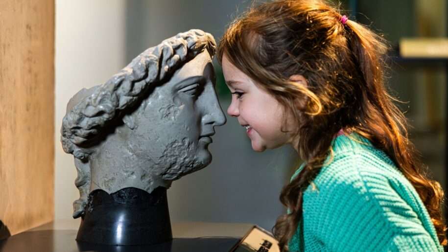 girl and roman baths head