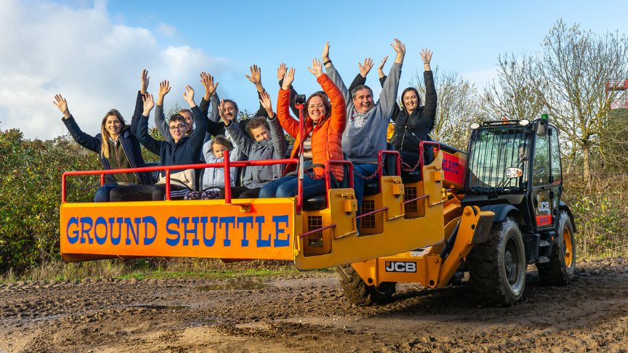 families ride on digger